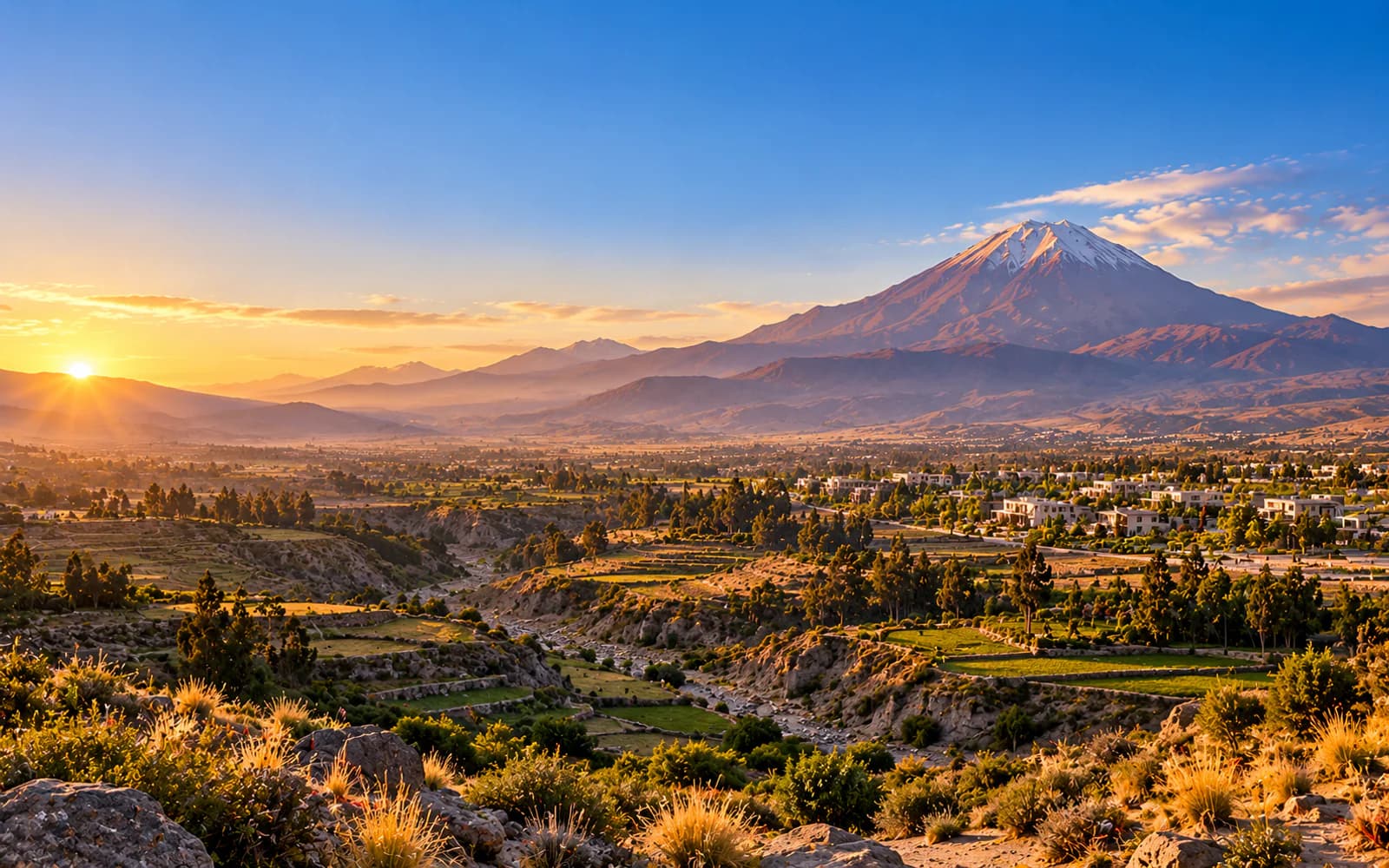 Visualización conceptual del paisaje arequipeño con el volcán Misti, andenes y el borde de un asentamiento planificado.